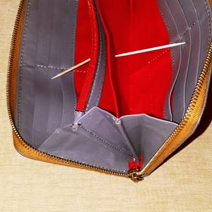 Dooney & Bourke Wallet New never used. Inside pockets zipper closure